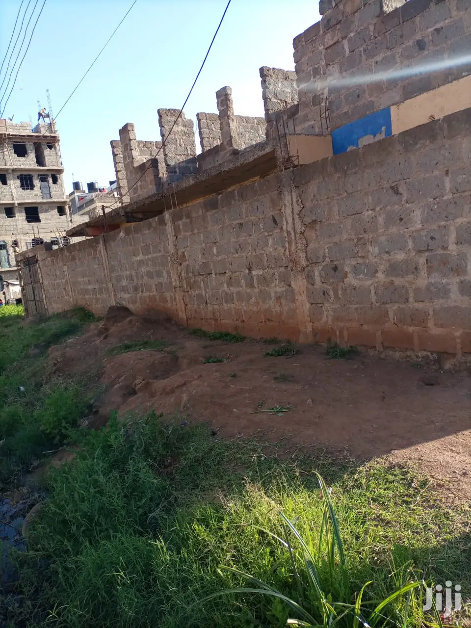 Juja Plot with 3 One-Bedroom Houses for Sale - Thika Road in Juja