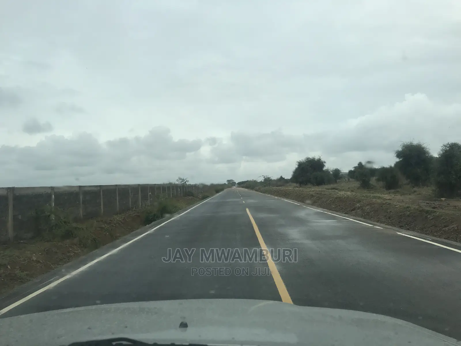 10 Acre Touching Daystar Rd in Lukenya