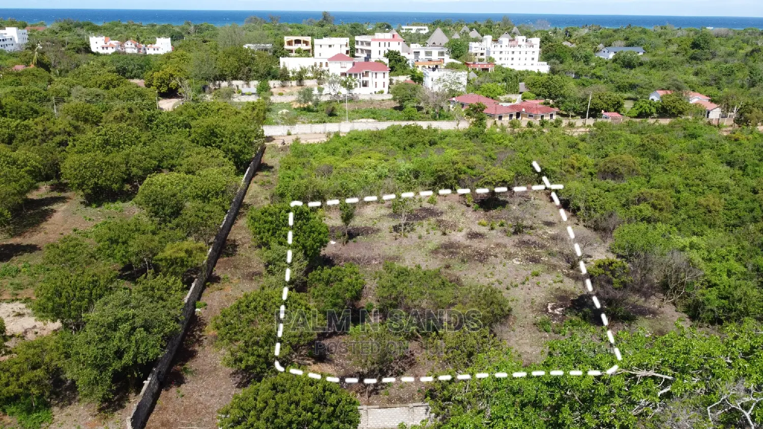 Half-acre beach plot offering unparalleled ocean vistas and easy access to amenities. Ideal for development! in Ukunda