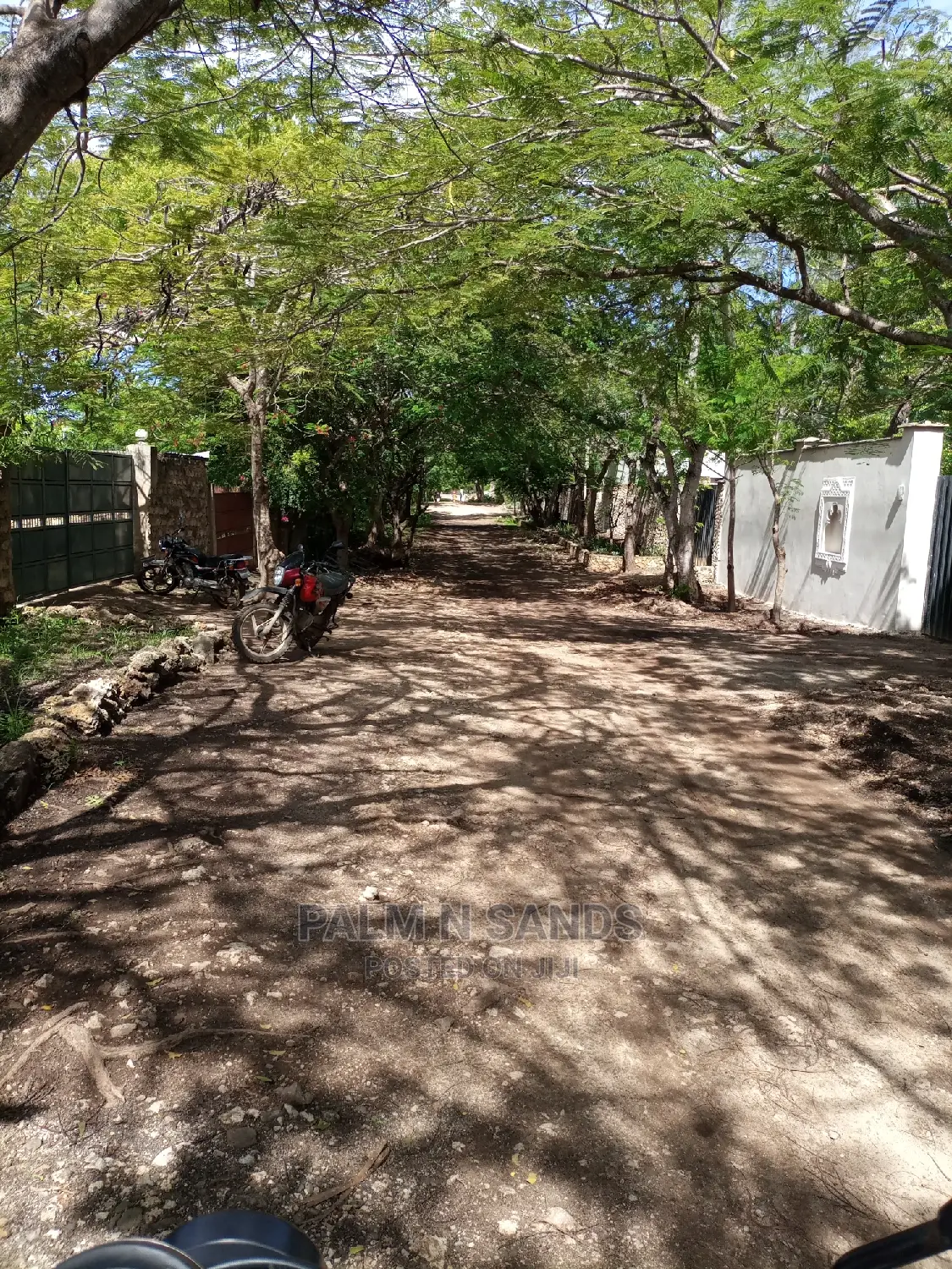 Half-acre beach plot offering unparalleled ocean vistas and easy access to amenities. Ideal for development! in Ukunda
