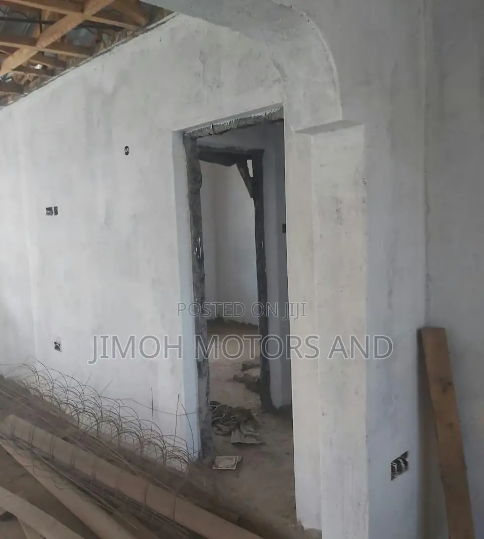 bedroom house with a large yard, perfect for a growing family or investment. Incomplete, ready for your personal touch! in Katani