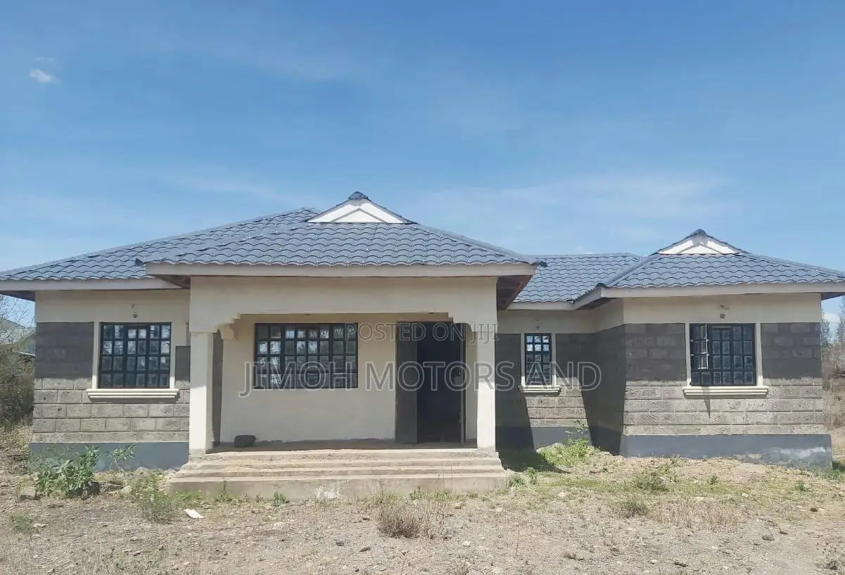 bedroom house with a large yard, perfect for a growing family or investment. Incomplete, ready for your personal touch! in Katani