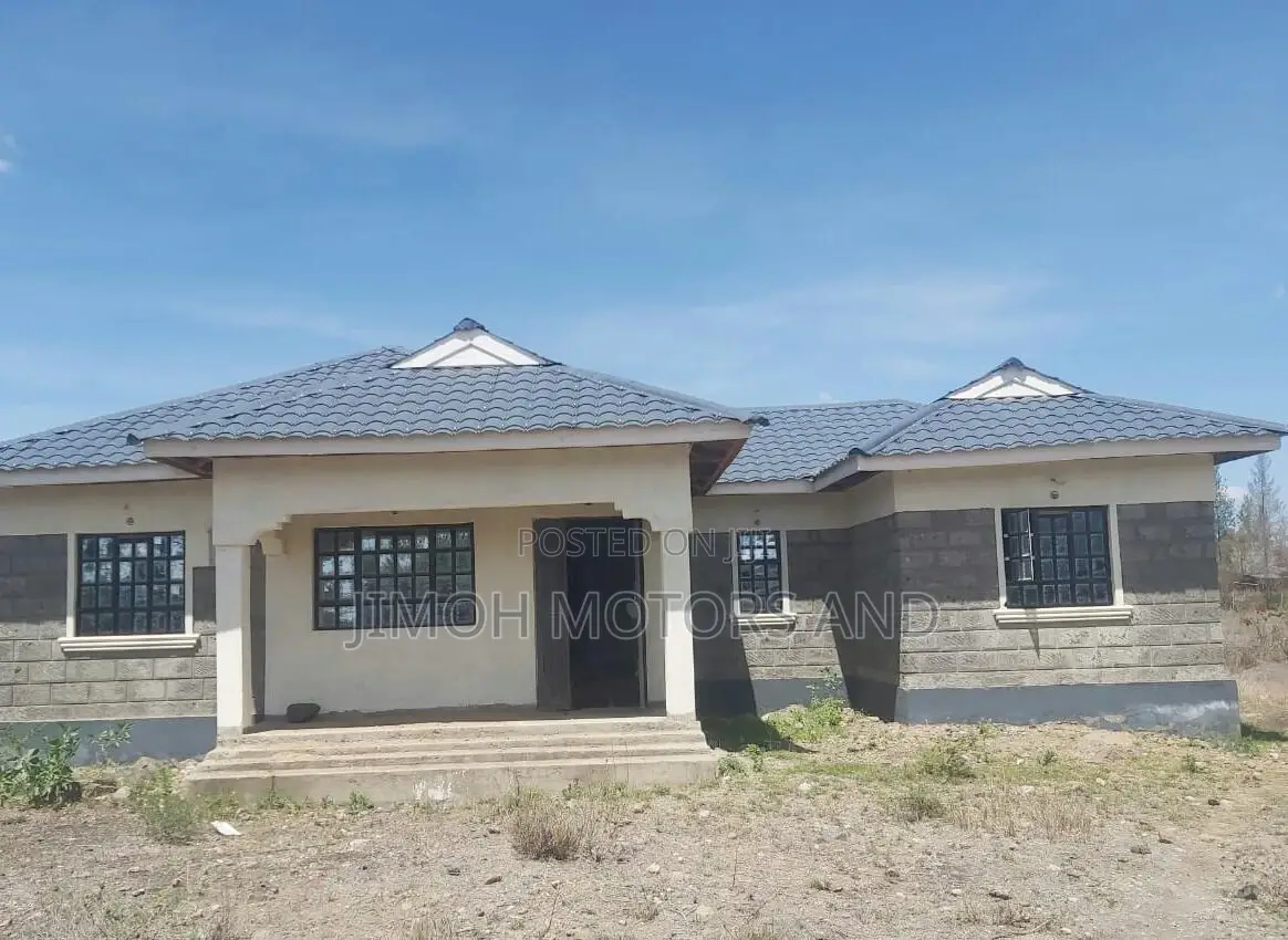 bedroom house with a large yard, perfect for a growing family or investment. Incomplete, ready for your personal touch! in Katani