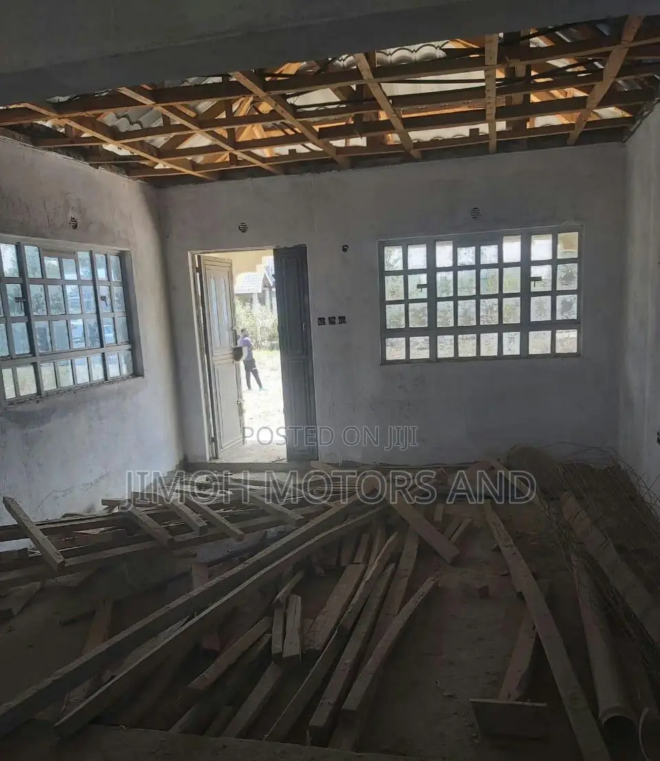 bedroom house with a large yard, perfect for a growing family or investment. Incomplete, ready for your personal touch! in Katani