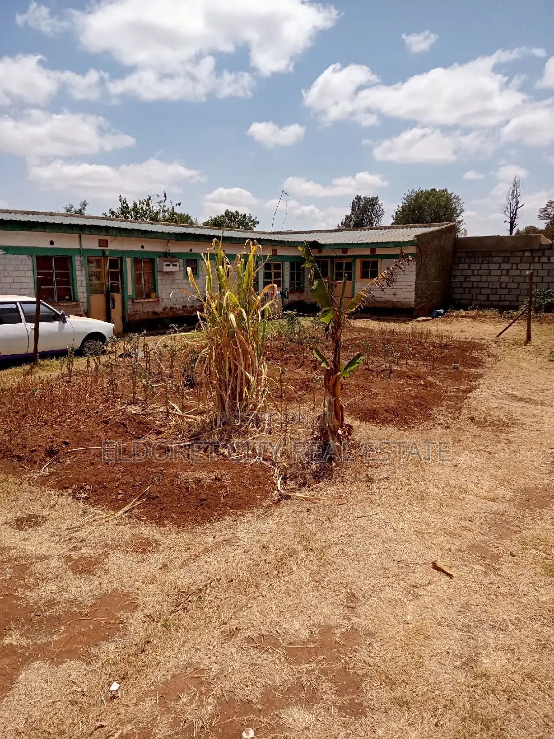 Spacious Kiumu 1/8 Plot with Built Structures - For Sale in Eldoret CBD