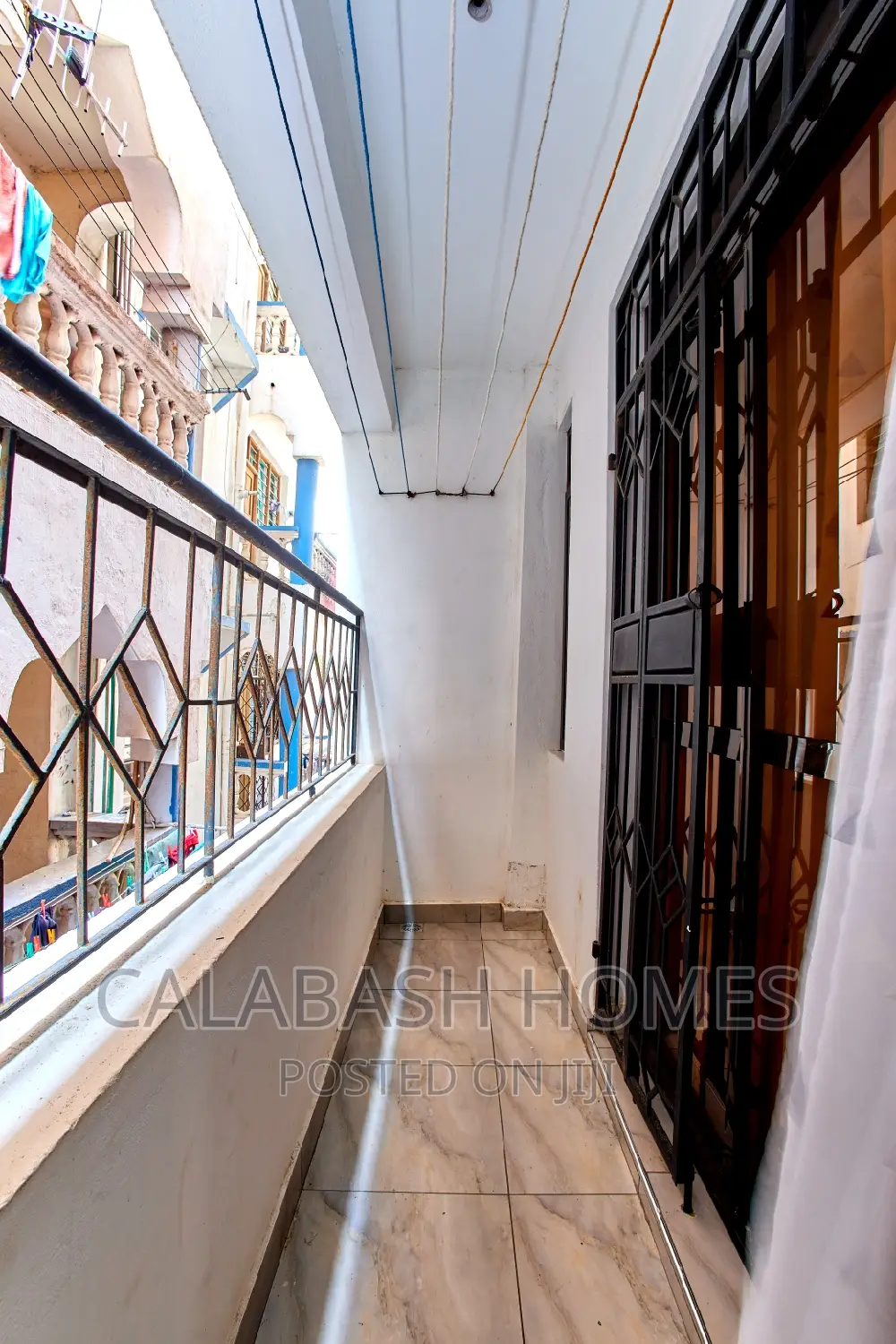 2BR Airbnb on Nyali Rd, VOK - AC, Parking, and a Convenient Location in Bombolulu