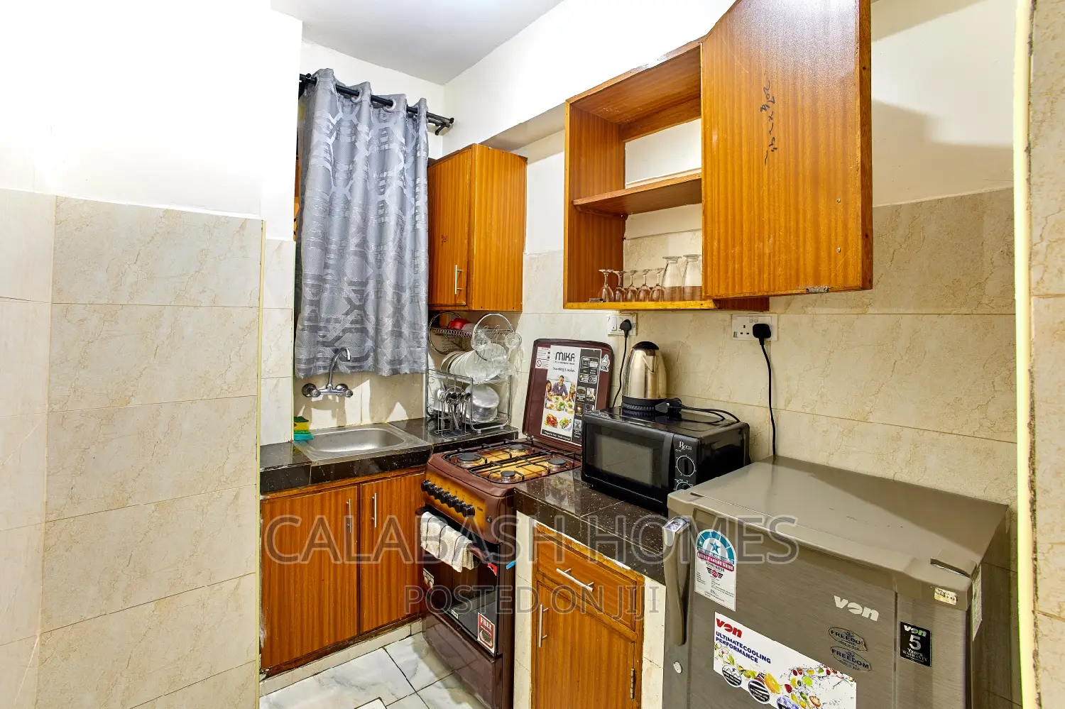 Cozy 1-Bedroom Apartment in Mombasa's VOK Area, Near Nyali Road - Airbnb with AC in Bombolulu