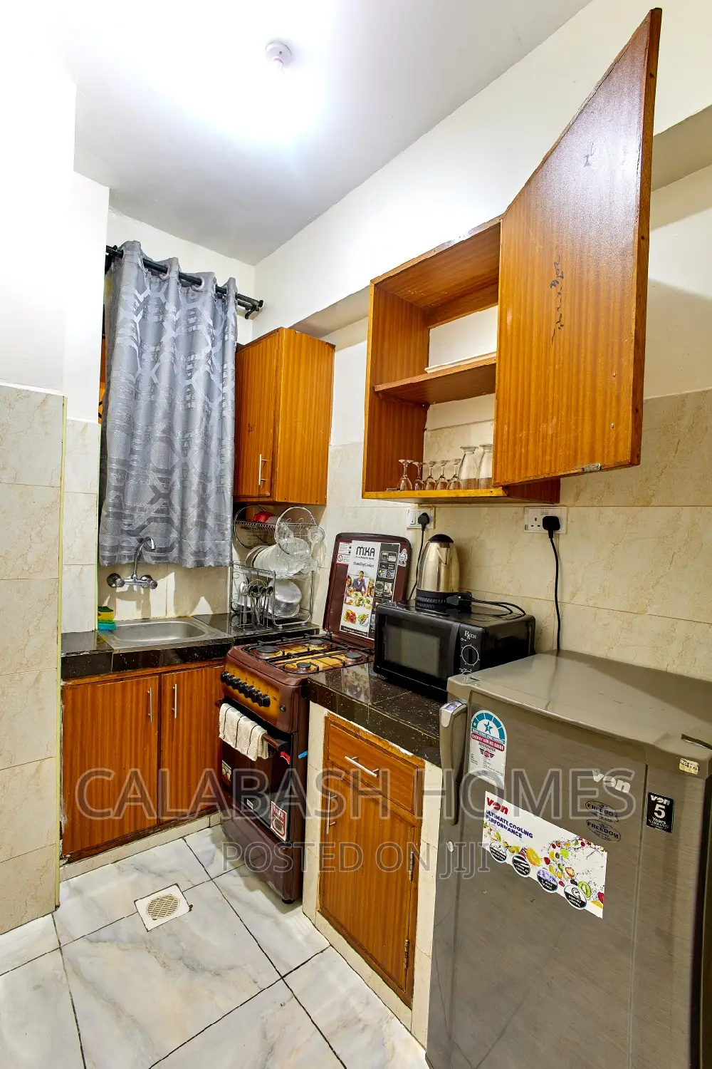 Cozy 1-Bedroom Apartment in Mombasa's VOK Area, Near Nyali Road - Airbnb with AC in Bombolulu