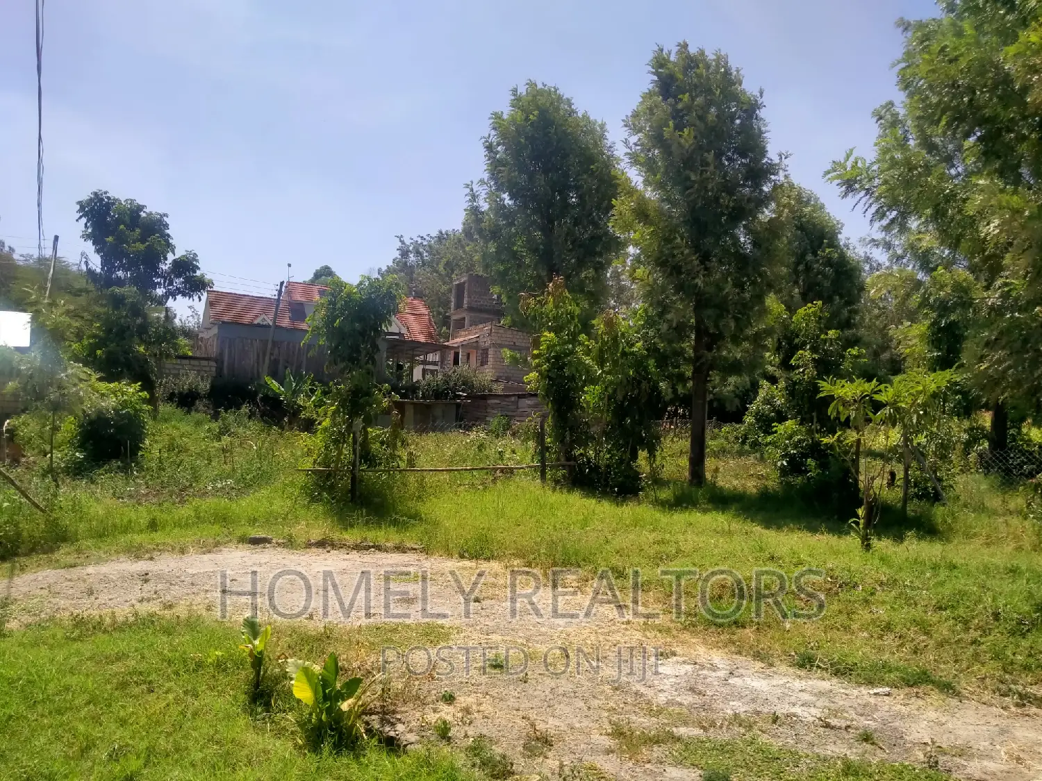 Kiserian's Prime Quarter Acre Plot: Tarmac Proximity, Gated Estate Access in Kiserian