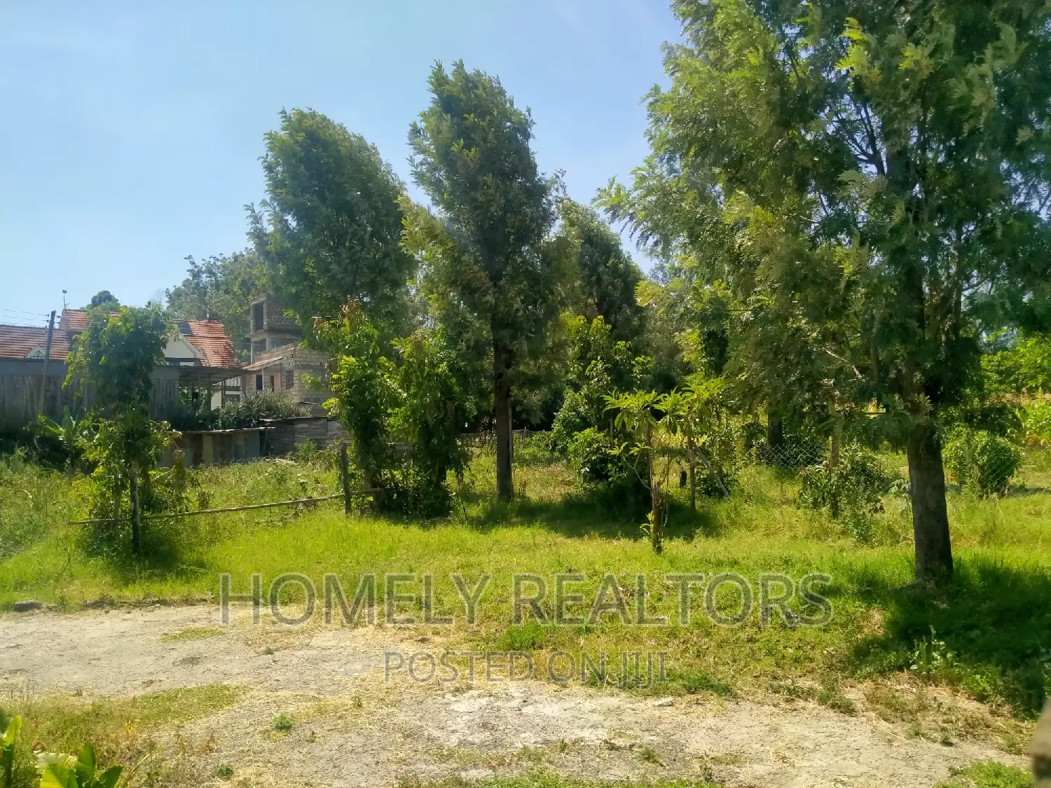 Kiserian's Prime Quarter Acre Plot: Tarmac Proximity, Gated Estate Access in Kiserian