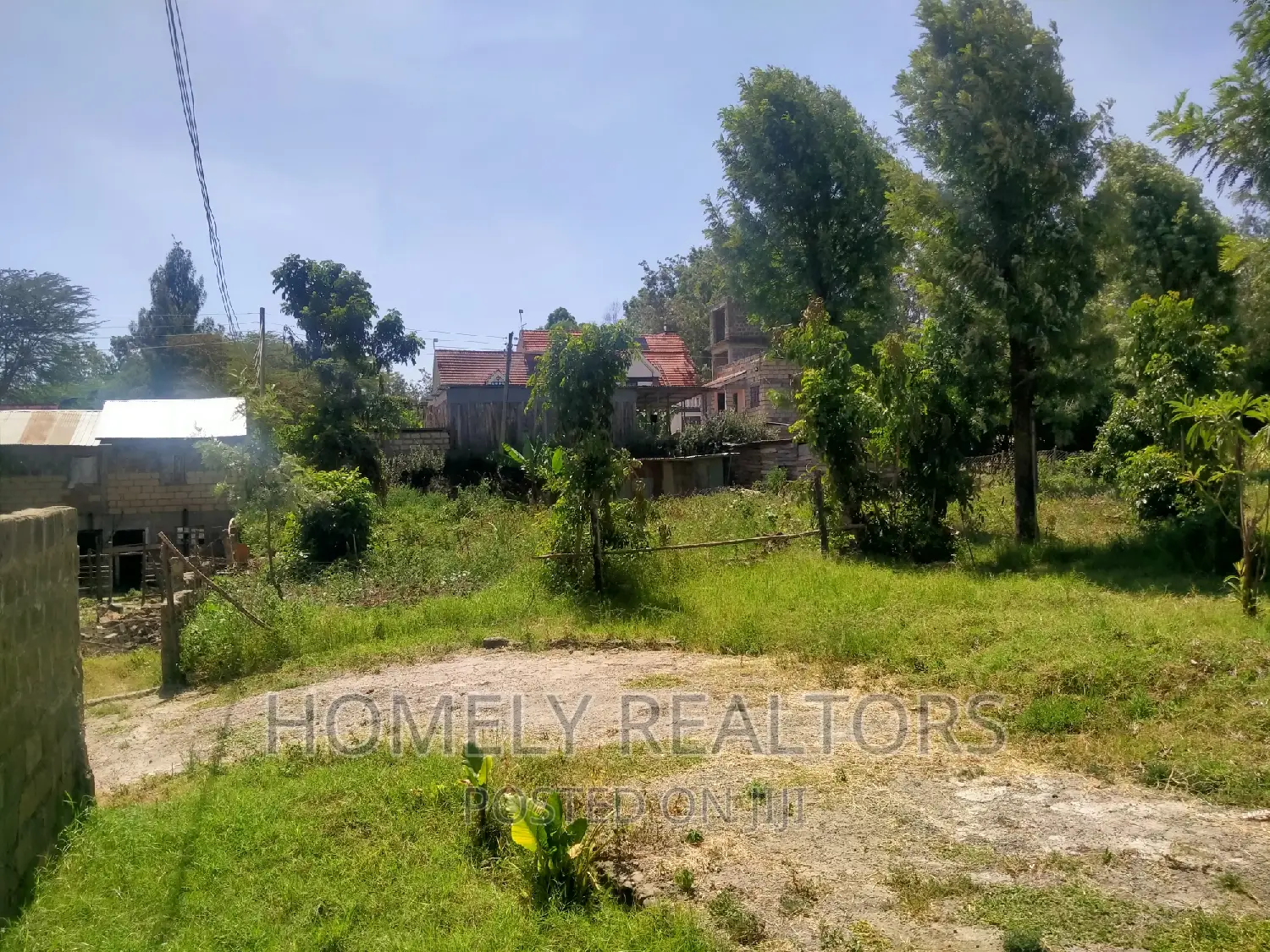 Kiserian's Prime Quarter Acre Plot: Tarmac Proximity, Gated Estate Access in Kiserian