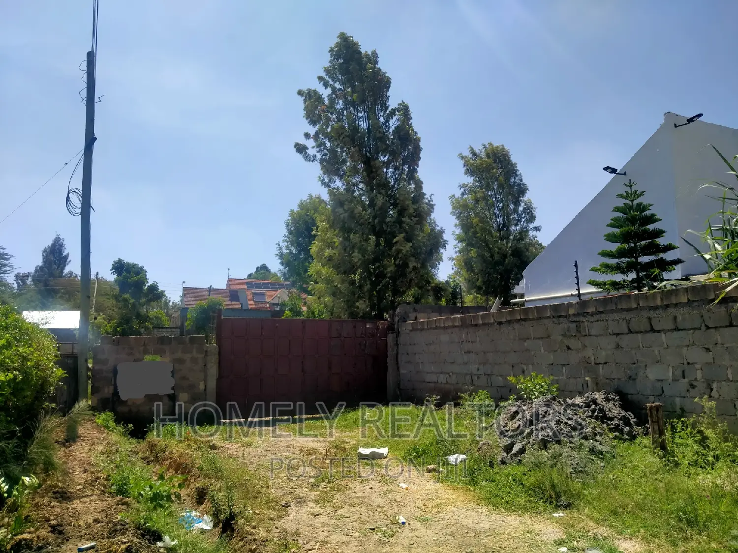 Kiserian's Prime Quarter Acre Plot: Tarmac Proximity, Gated Estate Access in Kiserian