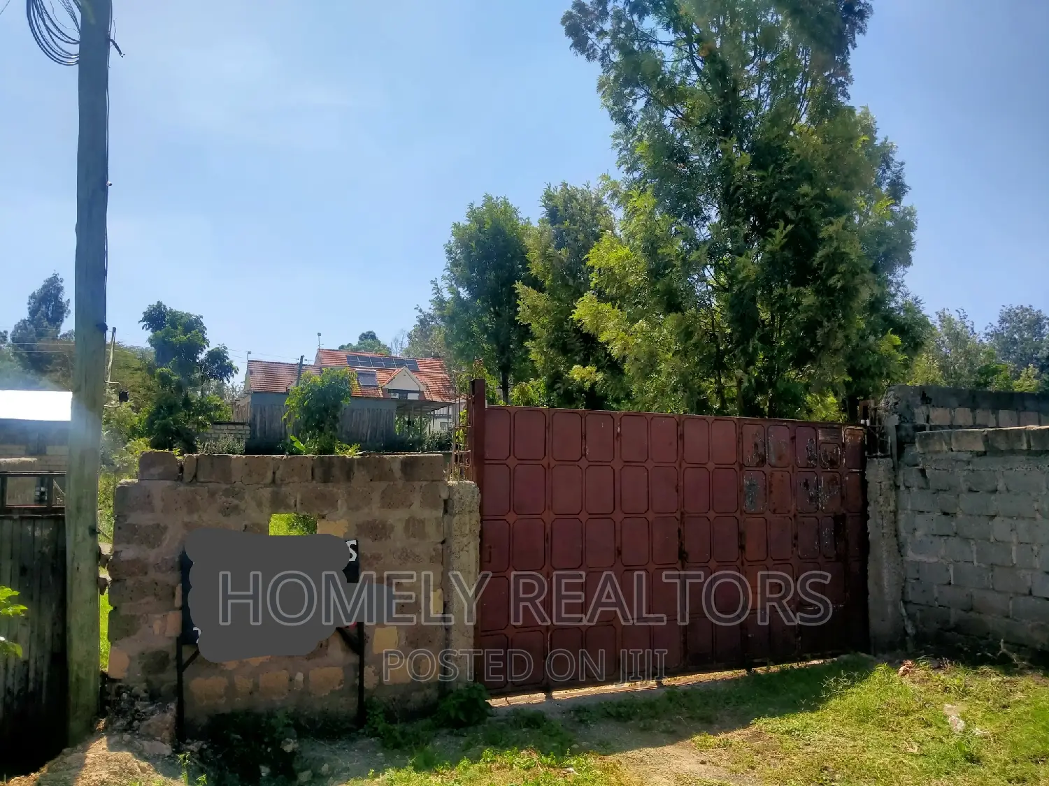 Kiserian's Prime Quarter Acre Plot: Tarmac Proximity, Gated Estate Access in Kiserian