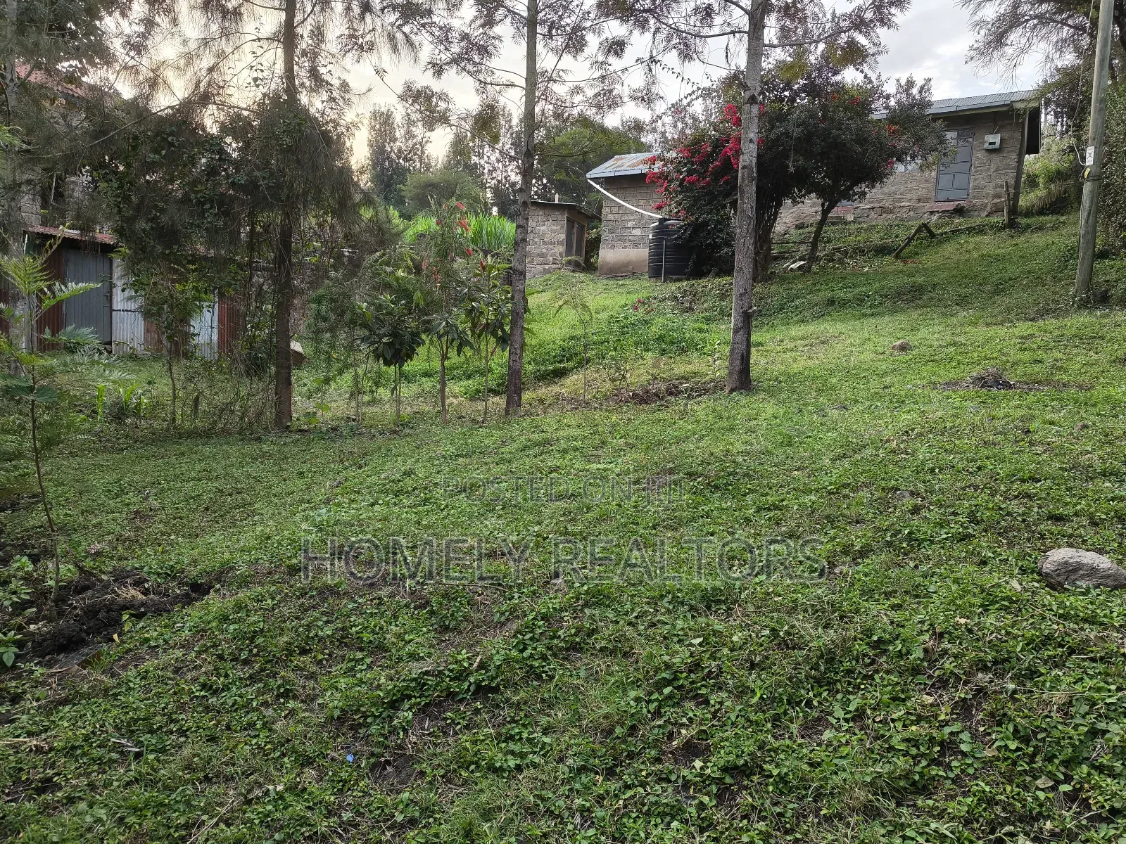 Quarter Acre Gated Corner Plot in Rimpa, Rongai With a House in Rimpa