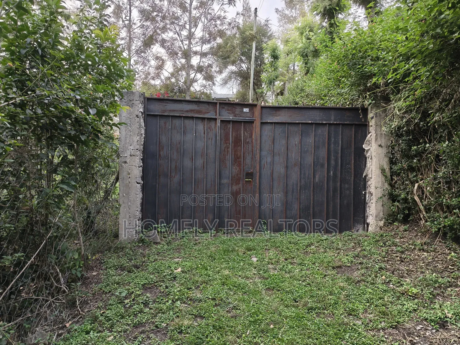 Quarter Acre Gated Corner Plot in Rimpa, Rongai With a House in Rimpa