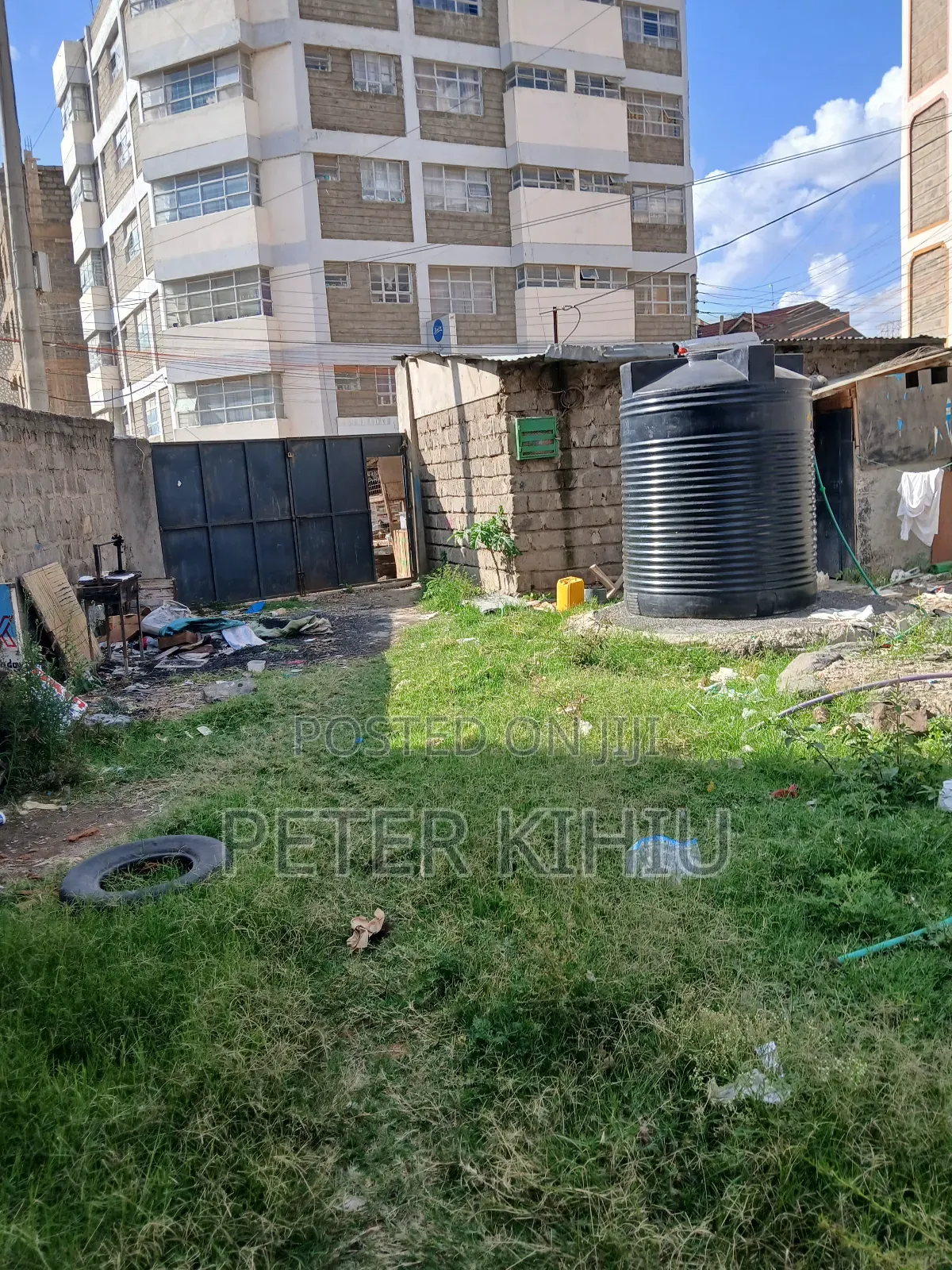 Tassia2 110ft by 33ft Plot With Wall Fence,Power,Water Tank and 2shops in Tassia