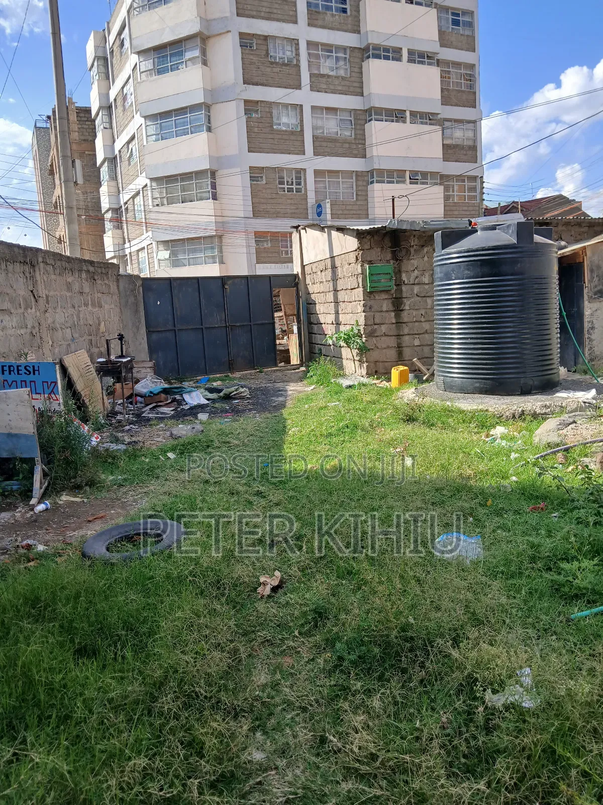 Tassia2 110ft by 33ft Plot With Wall Fence,Power,Water Tank and 2shops in Tassia