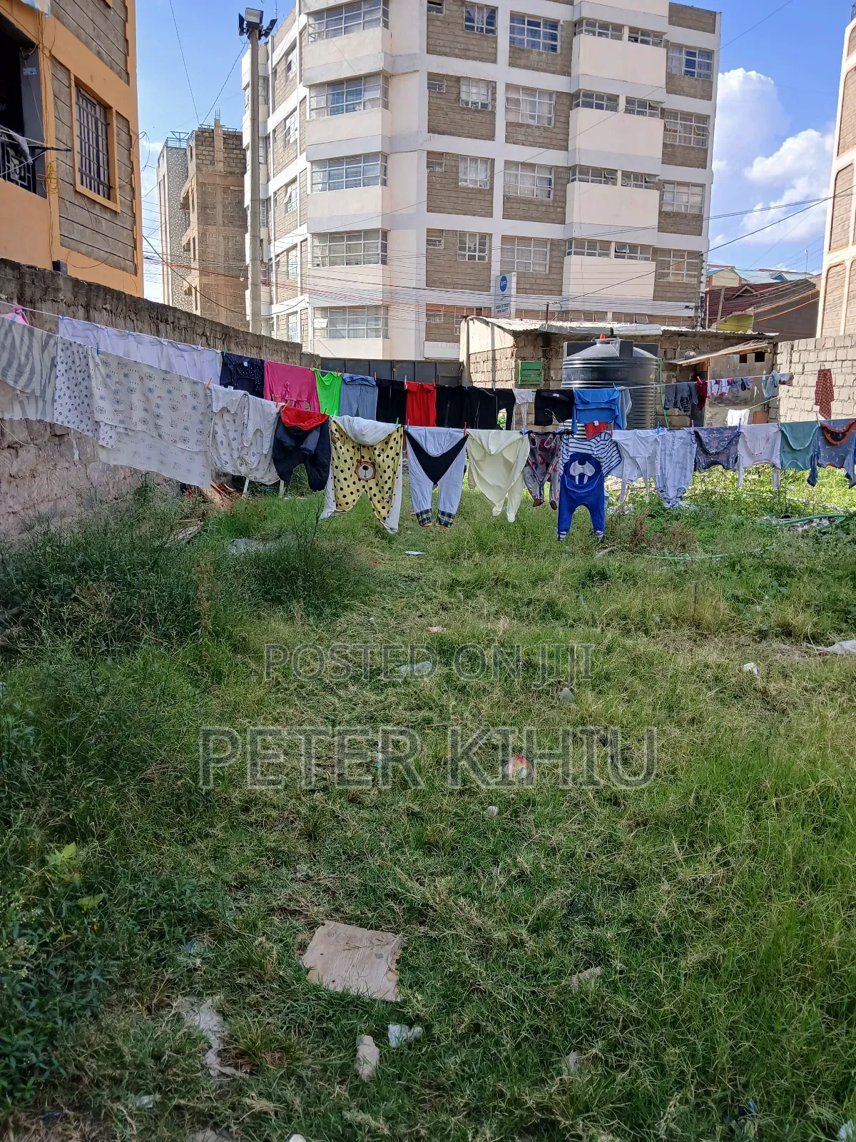 Tassia2 110ft by 33ft Plot With Wall Fence,Power,Water Tank and 2shops in Tassia