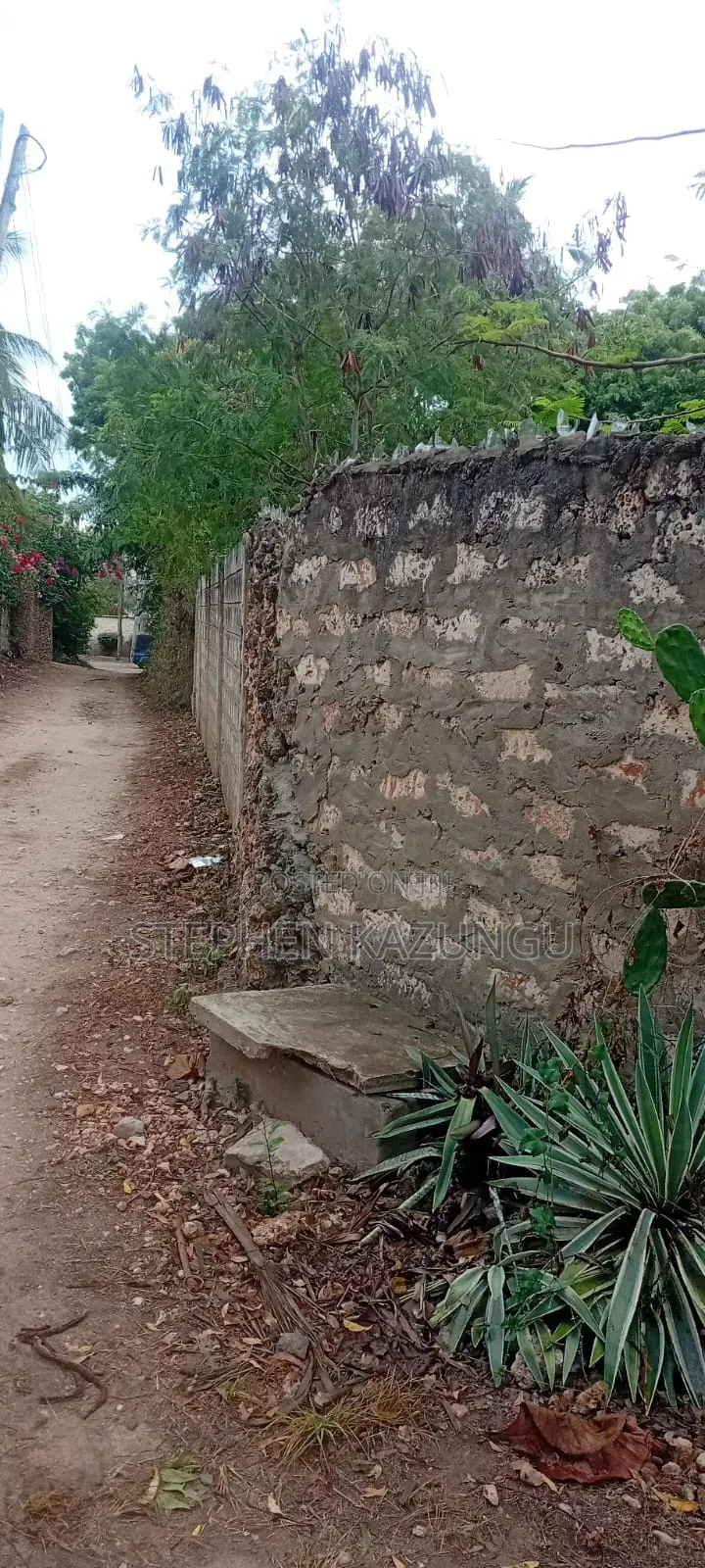 Galu Beach 3/4 Acre Plot Size With Houses, 3 Minutes to the Beach. in Ukunda