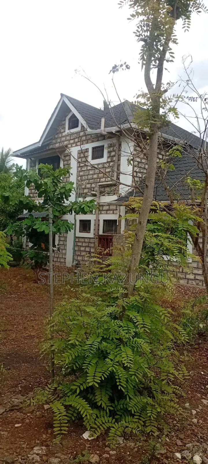 Galu Beach 3/4 Acre Plot Size With Houses, 3 Minutes to the Beach. in Ukunda