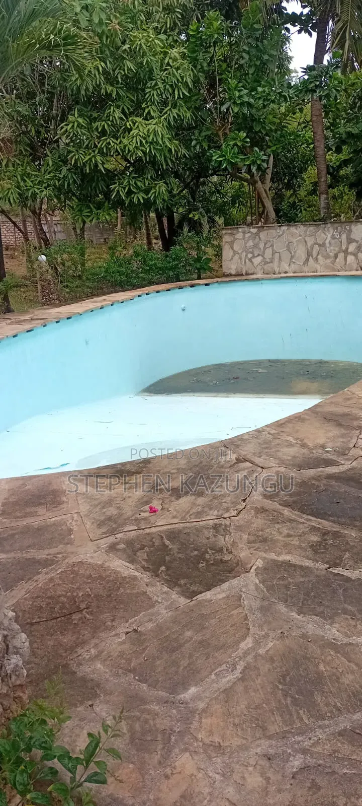 Galu Beach 3/4 Acre Plot Size With Houses, 3 Minutes to the Beach. in Ukunda
