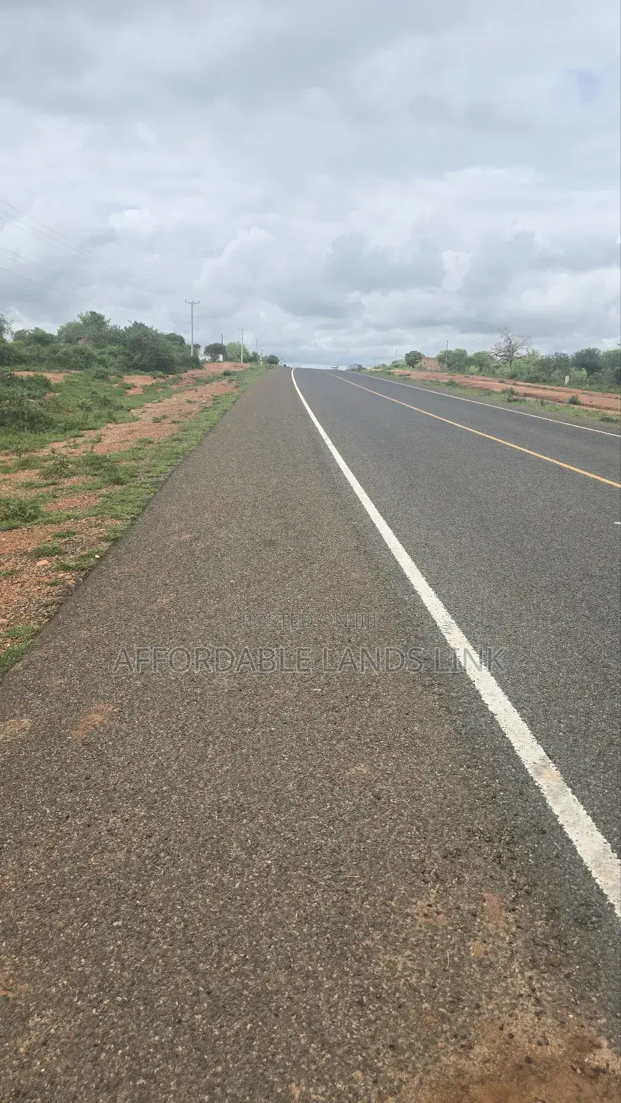 1acre Touching the Highway on Sale in Kikumbulyu North