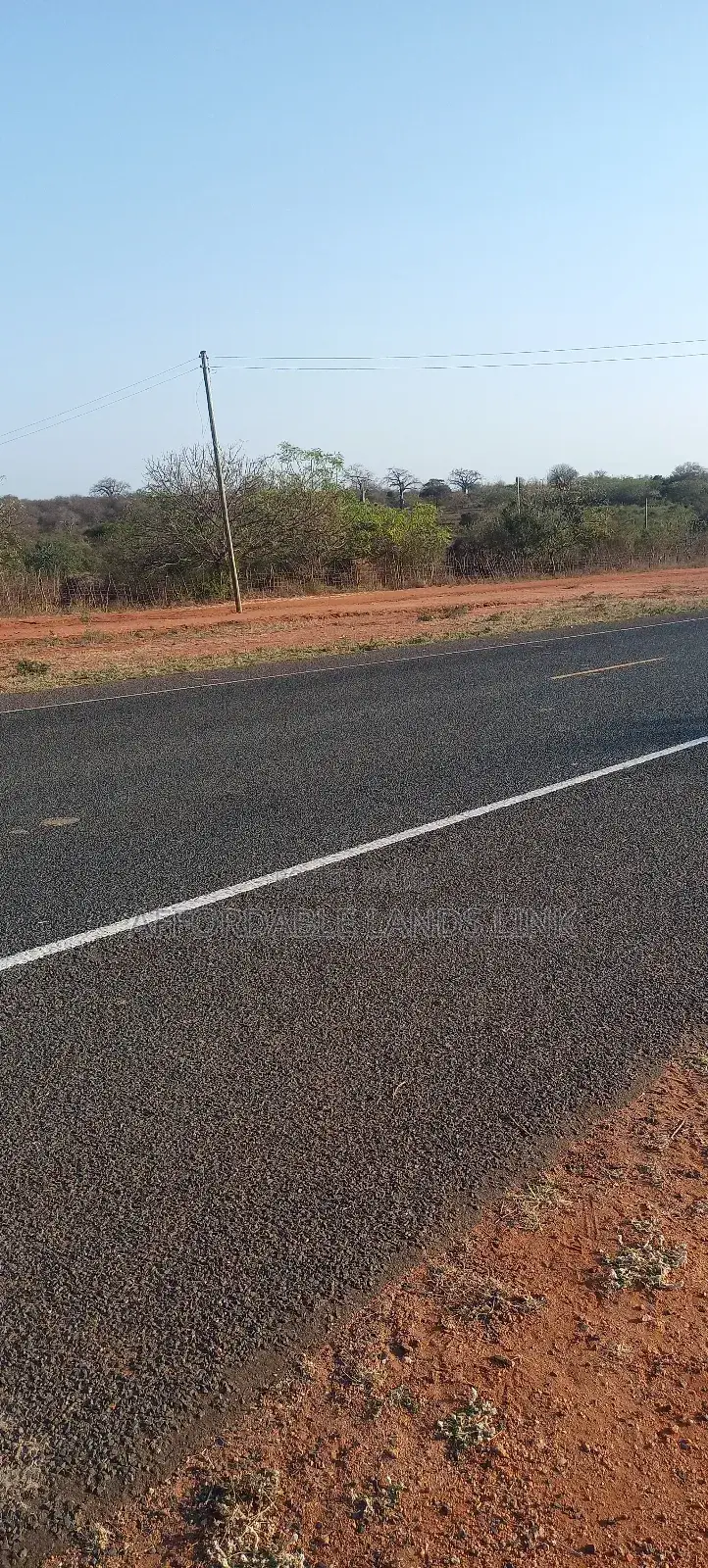 1acre Touching the Highway on Sale in Kikumbulyu North
