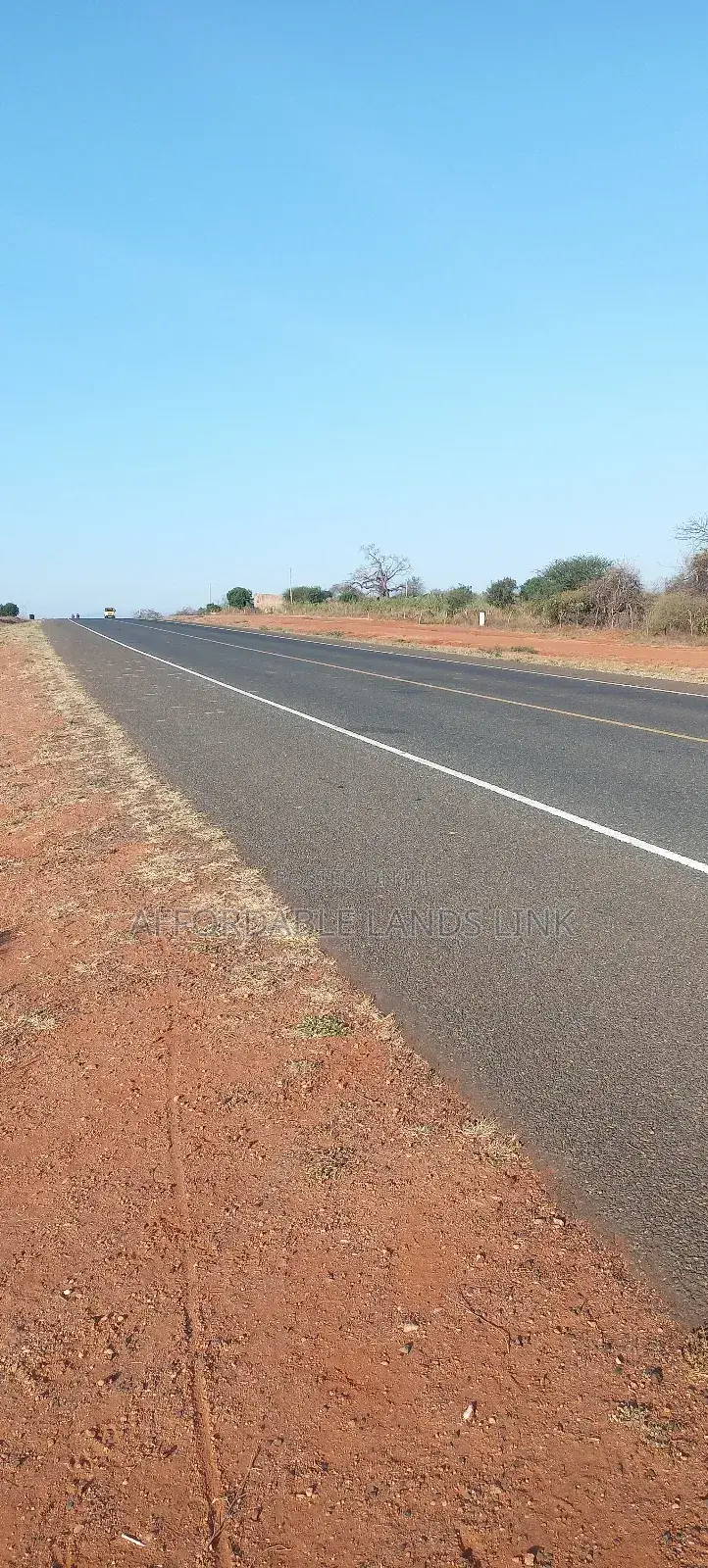 1acre Touching the Highway on Sale in Kikumbulyu North