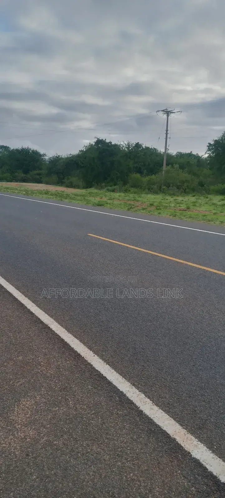 1acre Touching the Highway on Sale in Kikumbulyu North