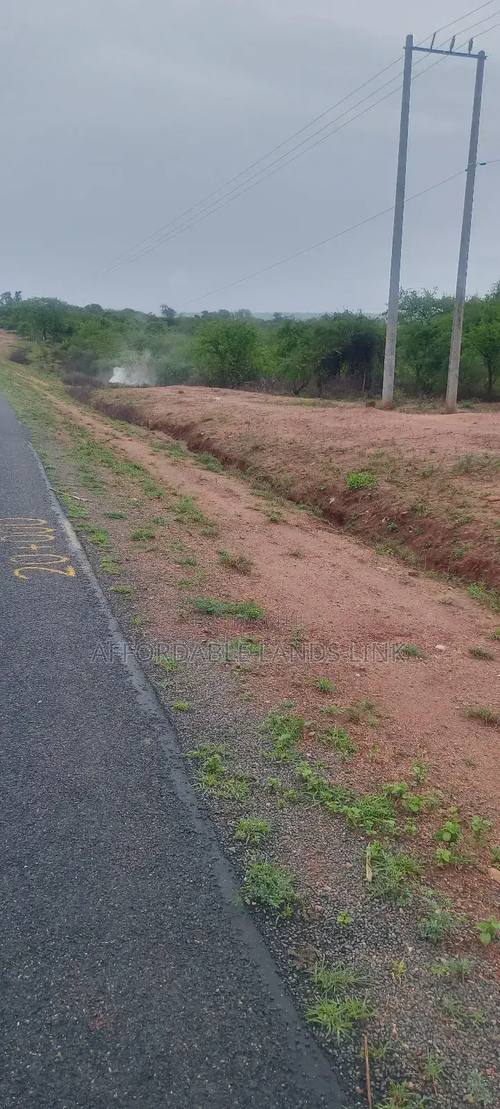 1acre Touching the Highway on Sale in Kikumbulyu North