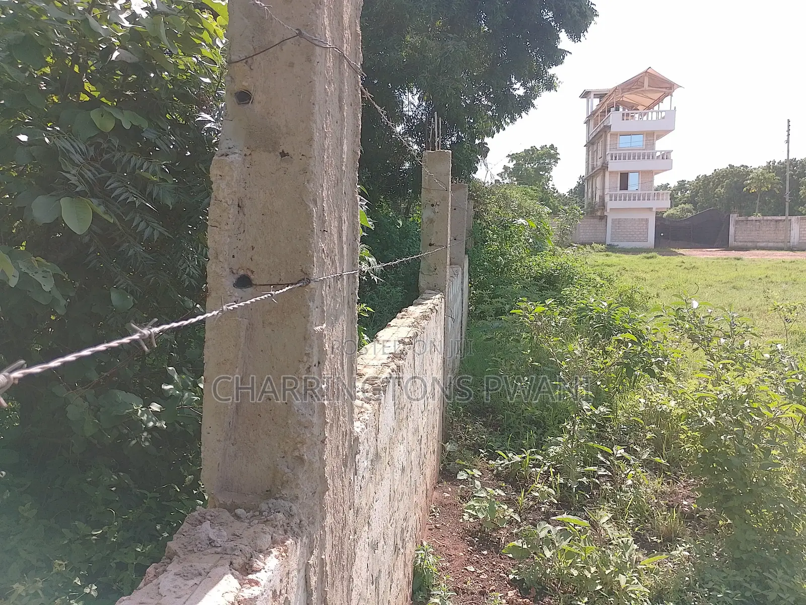 1 Acre Plot| 5th Row Diani | Flat| Perimeter Fence | All-Weather Road in Diani