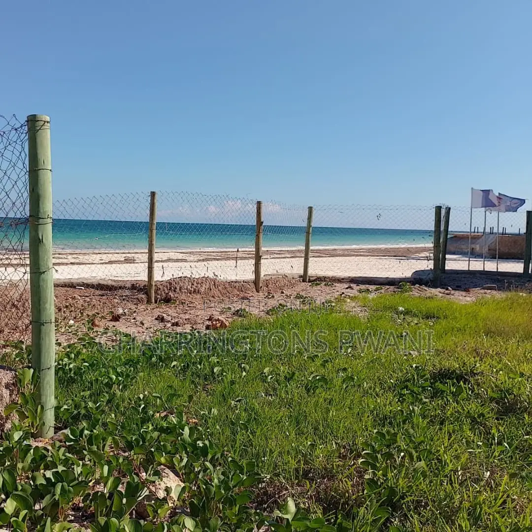 1 Acre Sandy Beachfront | Fenced Serviced | Galu Diani in Diani