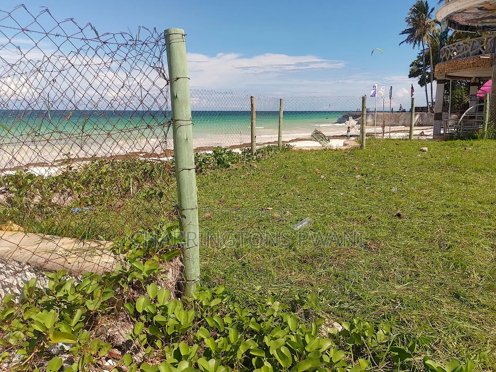 1 Acre Sandy Beachfront | Fenced Serviced | Galu Diani in Diani