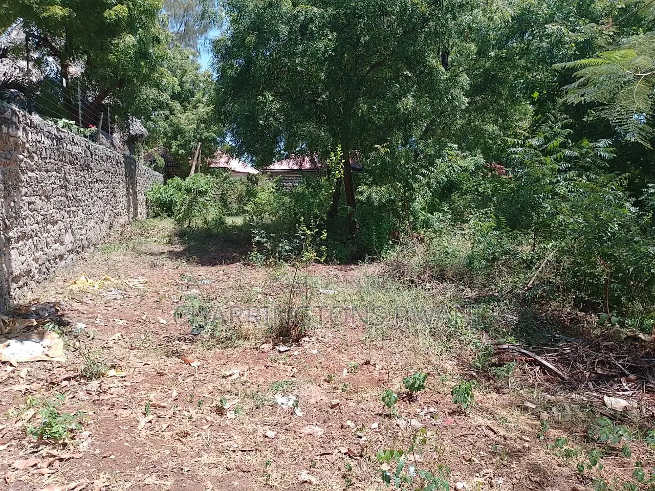 1⁄4 Acre Plot |Partial Perimeter Wall | Walk to Beach Airport in Diani