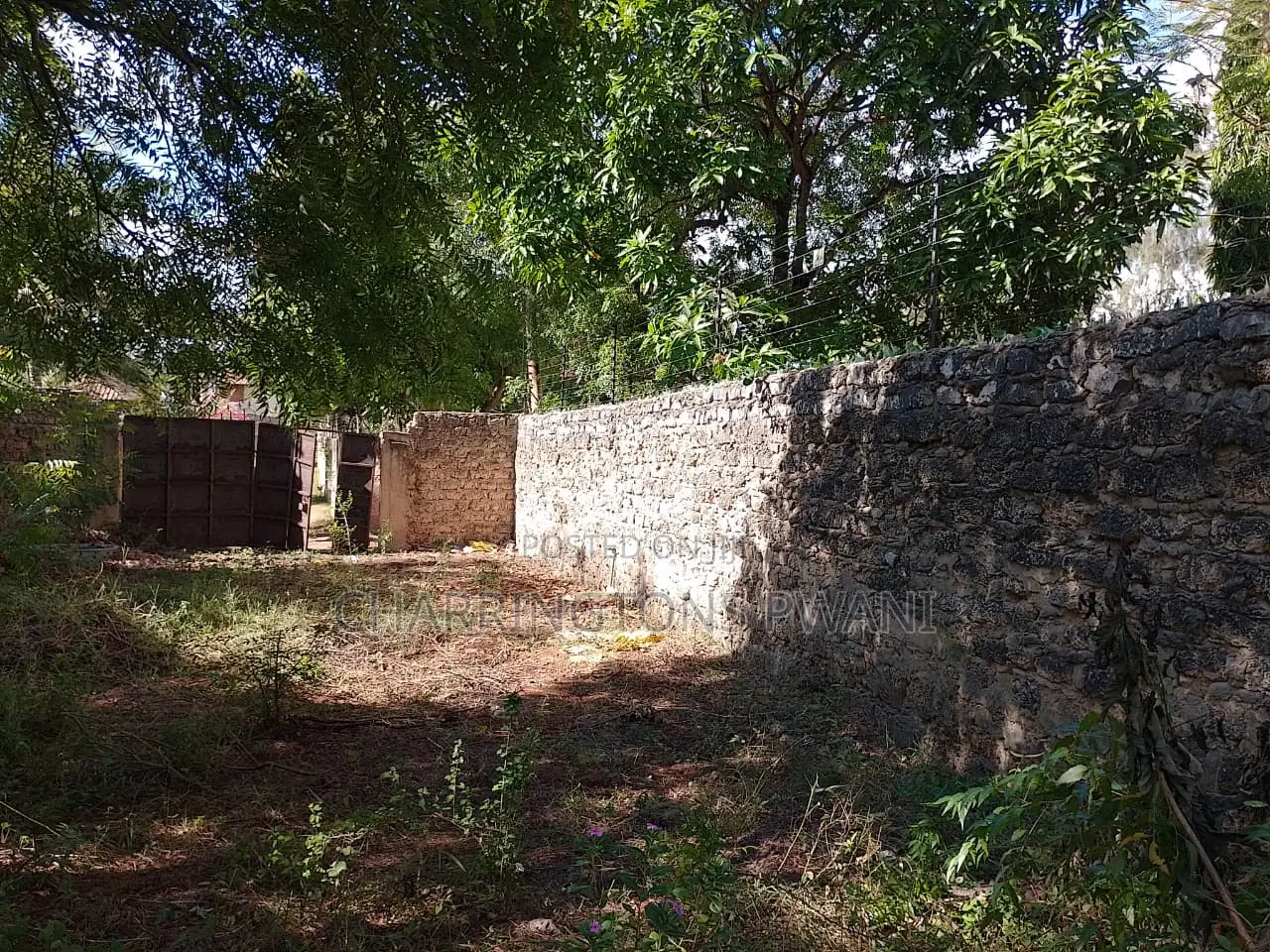 1⁄4 Acre Plot |Partial Perimeter Wall | Walk to Beach Airport in Diani