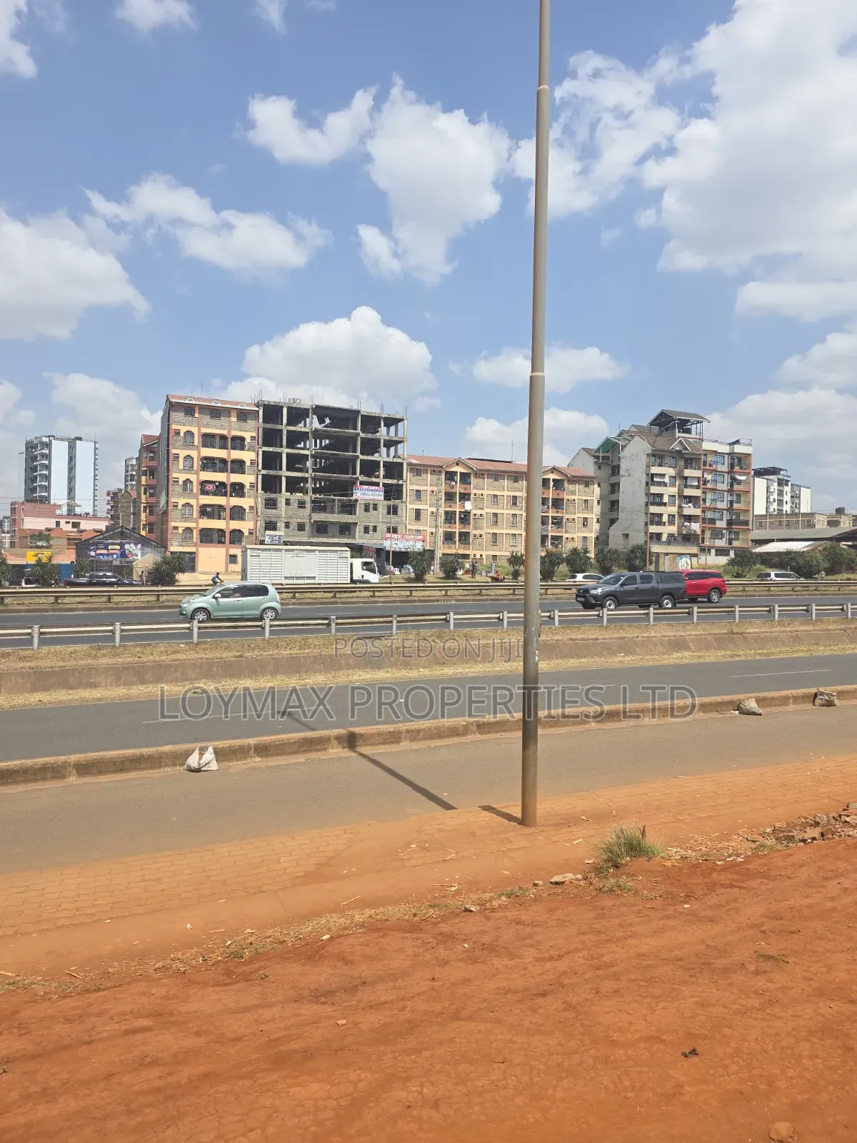 Distressed 100/100 Commercial Plot Touching Thika Super Highway. in Roysambu