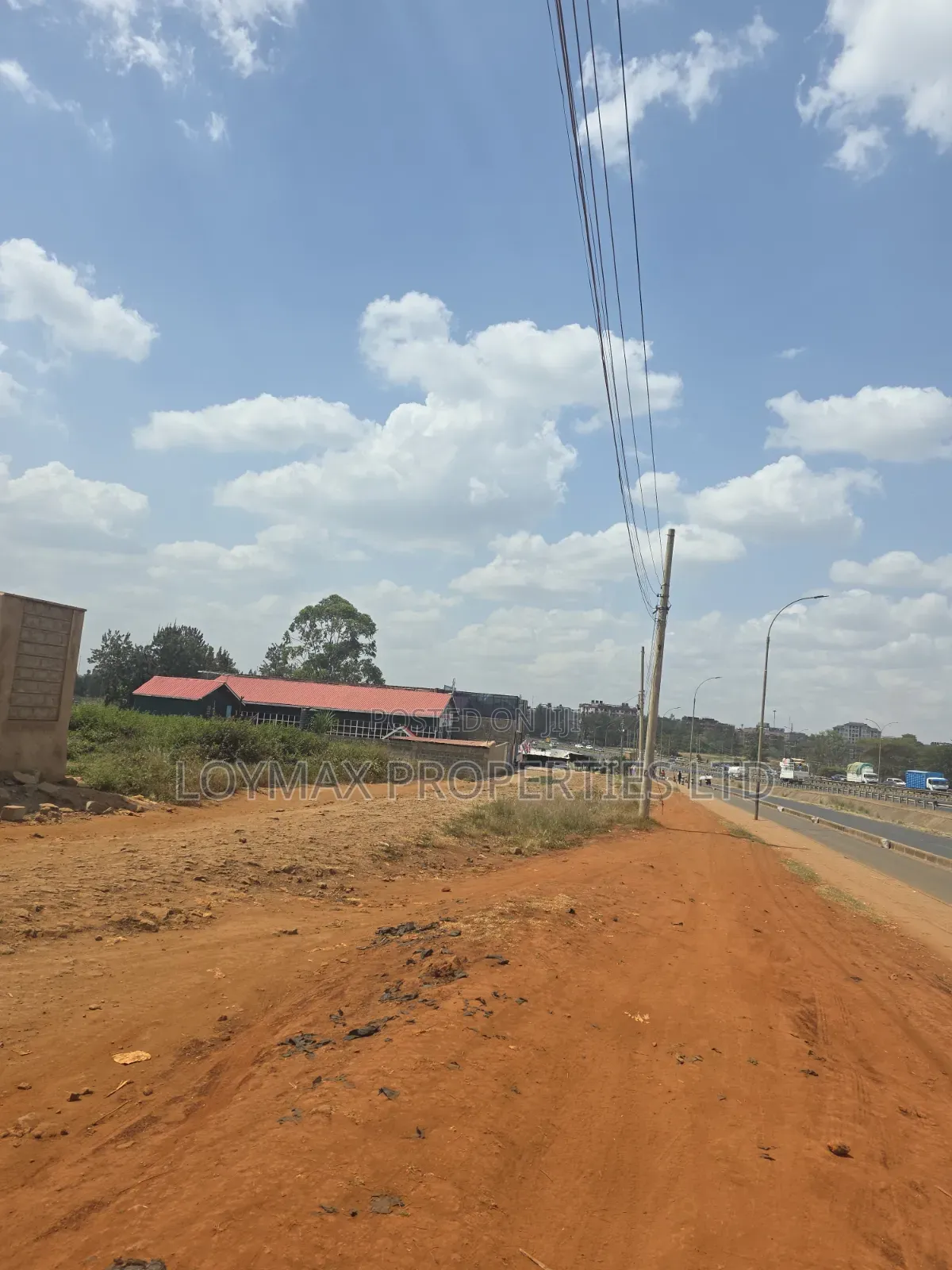 Distressed 100/100 Commercial Plot Touching Thika Super Highway. in Roysambu