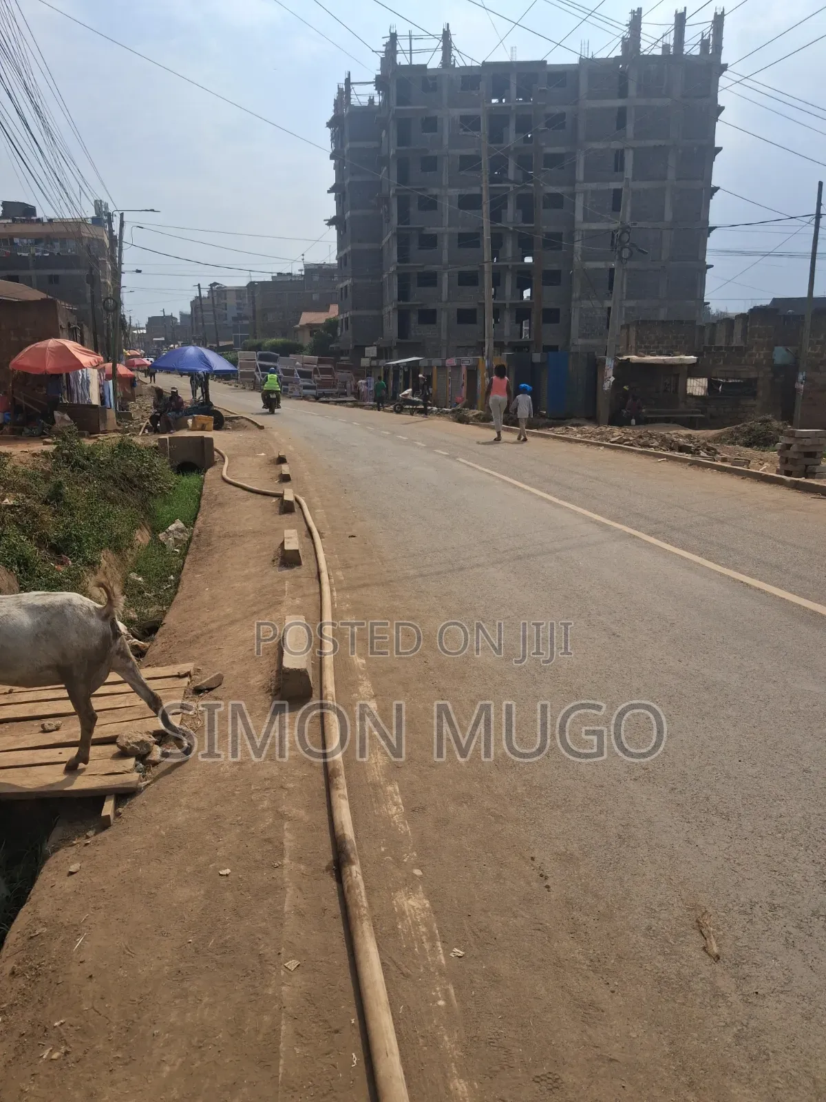 Roysambu Car Wash Area Commercial Plot on Tarmac Road in Roysambu
