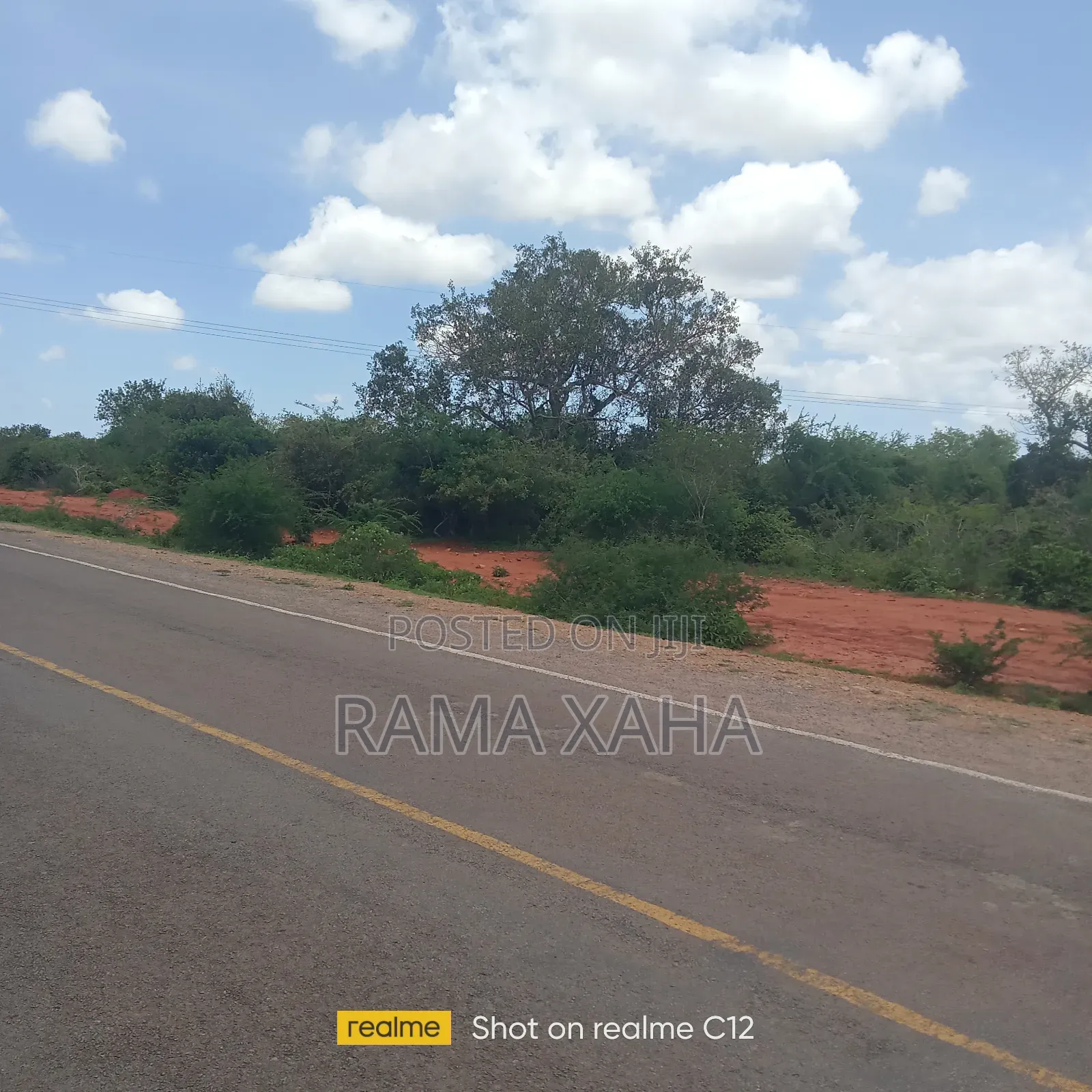 10 Acres Baolala Along the Tarmac Road in Jilore