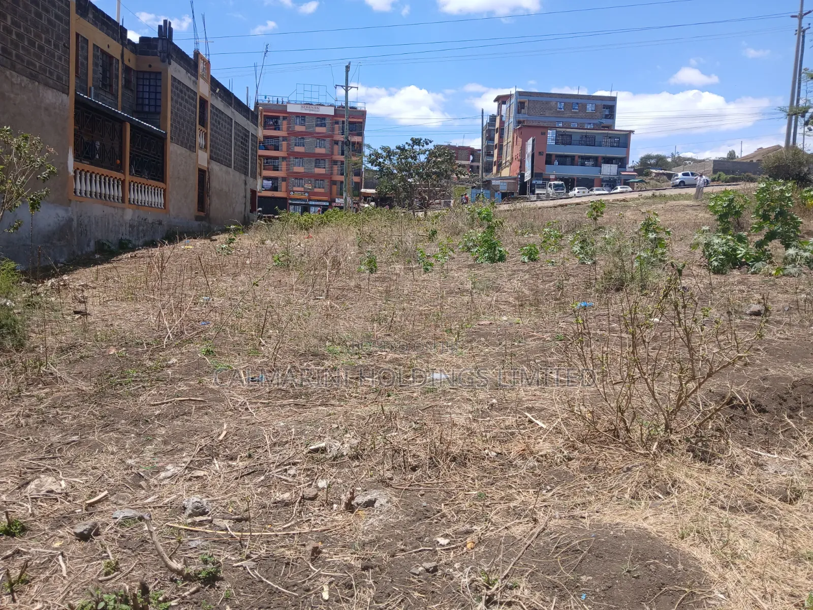 Most Prime COMMERCIAL 50 by 100 Plot Touching Magadi Road Tarmac in Kiserian